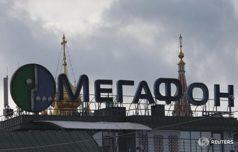 © Reuters. Реклама Мегафона на здании в Москве