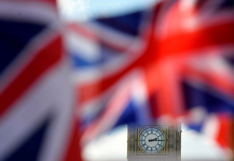 © Reuters. British Union flags fly in front of the Big Ben clocktower of The Houses of Parliament in central London