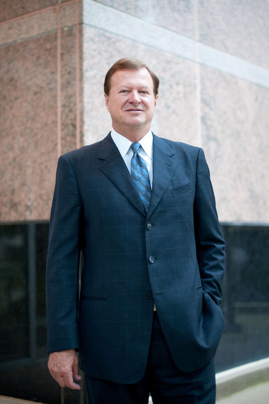 © Reuters. Chairman and Chief Executive Officer of Magnum Hunter Resources Corporation, Gary C. Evans, poses for a portrait at the company's new headquarters in Irving