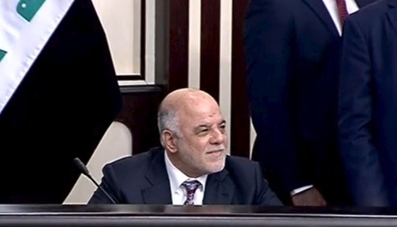 © Reuters. Iraq's Prime Minister Haider al-Abadi attends parliament in Baghdad, Iraq