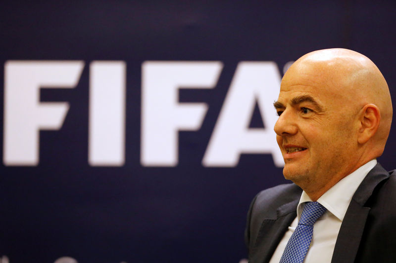 © Reuters. FIFA President Gianni Infantino arrives at a news conference in Bangkok