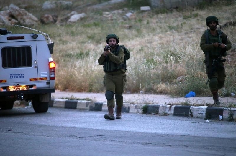 © Reuters. الجيش الإسرائيلي: جنود يقتلون سائقا فلسطينيا صدم جنودا في الضفة الغربية