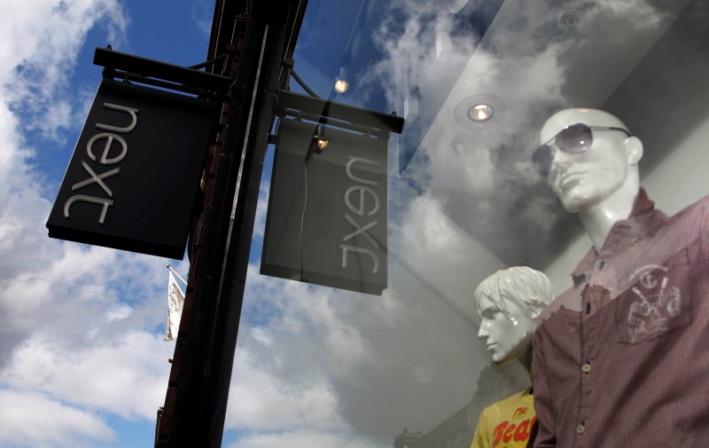 © Reuters. File photo of mannequins in the window of a Next clothing store in London