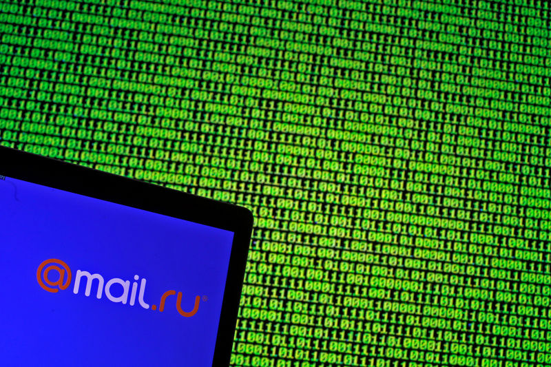 © Reuters. Illustration picture of Mail.ru logo seen in front of a displayed binary code