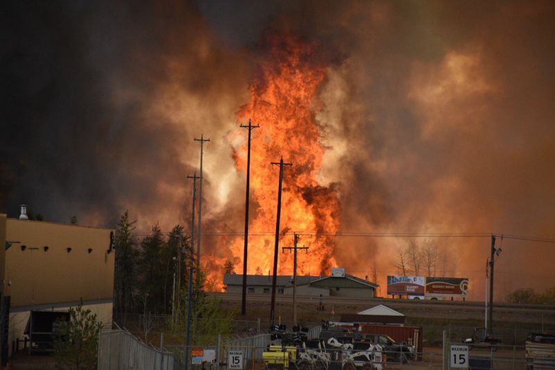 © Reuters. Flames rise in Industrial area south Fort McMurray Alberta Canada