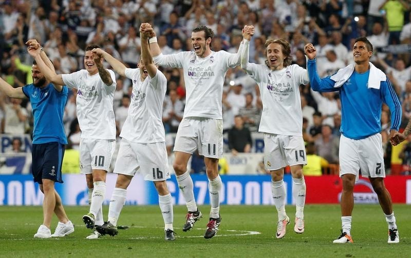 © Reuters. El Madrid augura una dura repetición de la final madrileña en la Champions