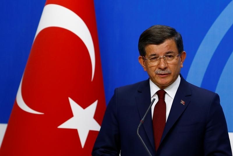 © Reuters. Turkish Prime Minister Davutoglu speaks during a news conference at his ruling AK Party headquarters in Ankara