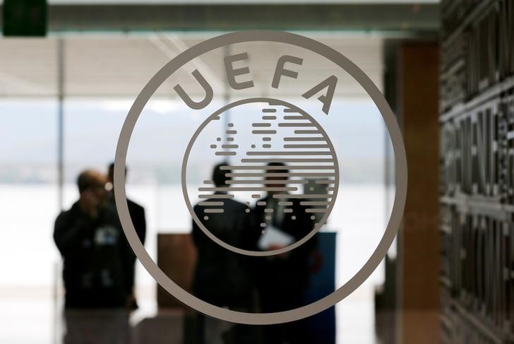 © Reuters. A logo is pictured on UEFA headquarters in Nyon