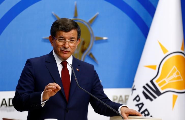 © Reuters. Turkish Prime Minister Davutoglu speaks during a news conference at his ruling AK Party headquarters in Ankara