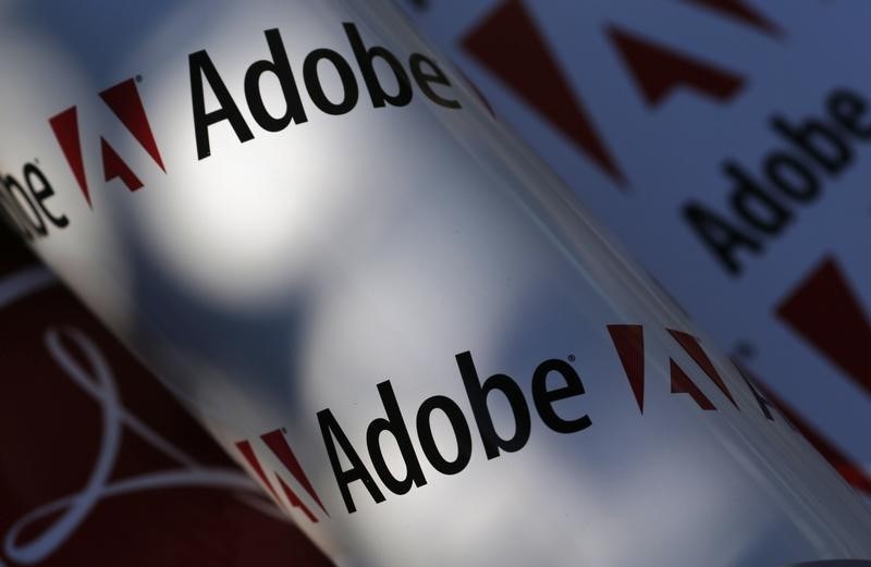 © Reuters. Picture illustration shows Adobe company logos, in Vienna