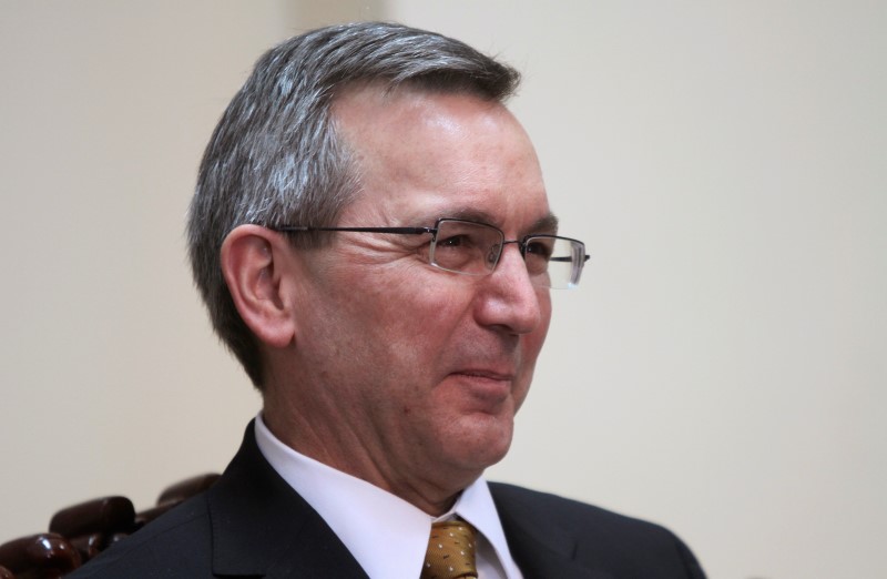 © Reuters. File photo of Scot Marciel smiling during a meeting with Ouch Borith, secretary of state at the Foreign Affairs Ministry, in Phnom Penh