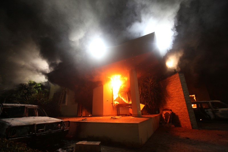 © Reuters. The U.S. Consulate in Benghazi is seen in flames during a protest