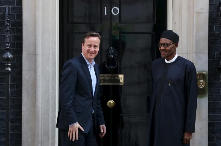 © Reuters. Nigeria's President-elect Buhari departs after meeting with Britain's Prime Minister Cameron at Downing Street in London