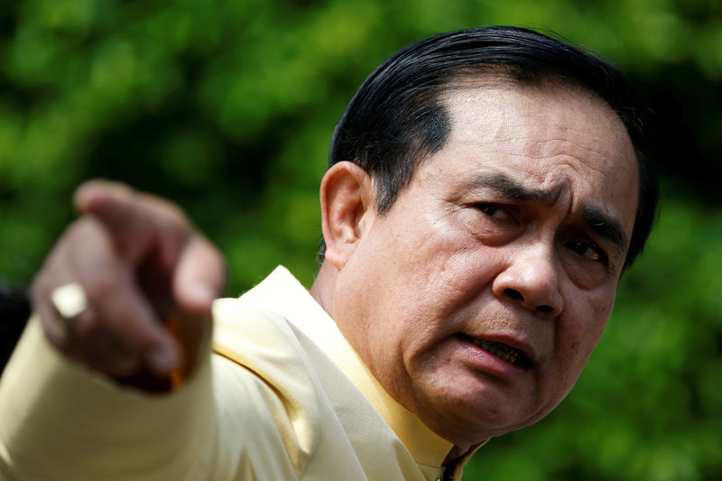 © Reuters. File photo of Thailand's Prime Minister Prayuth gesturing before a weekly cabinet meeting at Government House in Bangkok