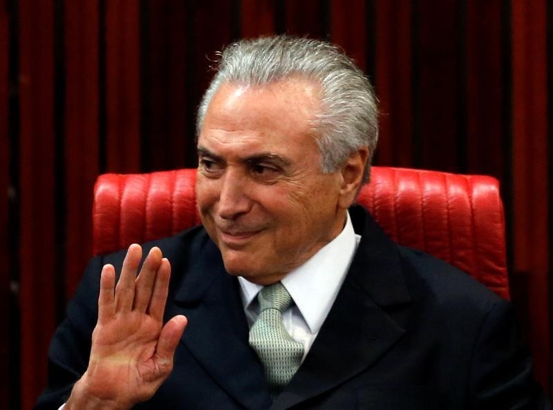 © Reuters. Temer pide confiar en la recuperación de Brasil e insta a la unidad