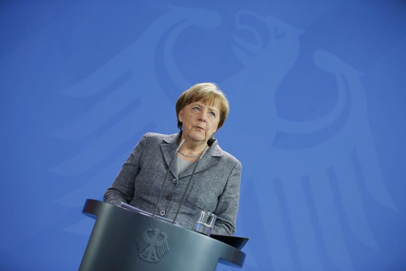 © Reuters. ANGELA MERKEL, CIBLE DE MENACES