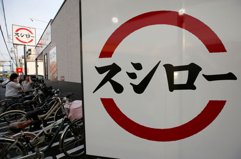 © Reuters. The logo of sushi restaurant chain Sushiro is displayed outside the restaurant in Kawaguchi