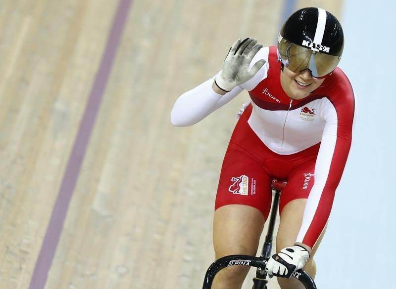© Reuters. England's Jess Varnish waves after winning the bronze medal in the women's sprint finals cycling race at the 2014 Commonwealth Games in Glasgow