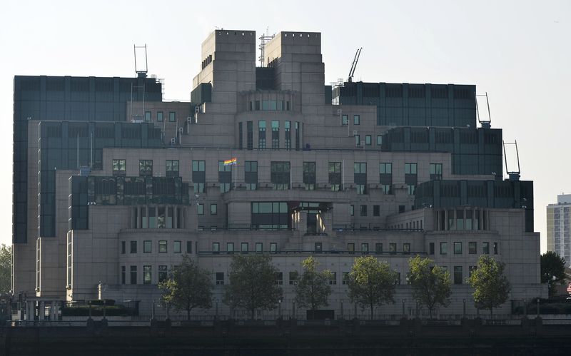 © Reuters. The MI6 Vauxhall Cross building raises the Rainbow Flag to mark its support for the International Day Against Homophobia, Transphobia and Biphobia in London