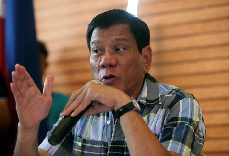 © Reuters. President-elect Rodrigo "Digong" Duterte speaks during a news conference in his hometown Davao City