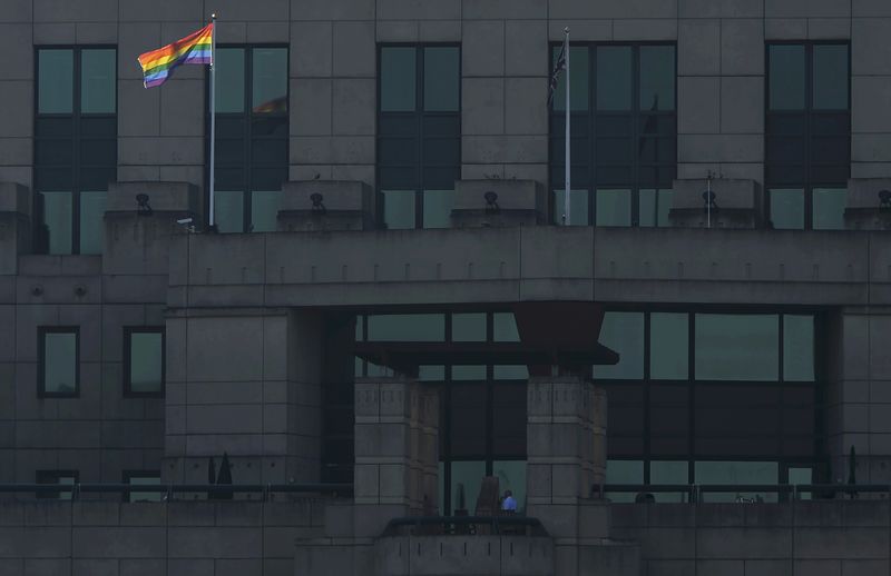 © Reuters. The MI6 Vauxhall Cross building raises the Rainbow Flag to mark its support for the International Day Against Homophobia, Transphobia and Biphobia in London