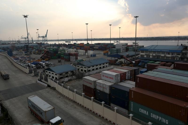© Reuters. Asia World port terminal seen in Yango