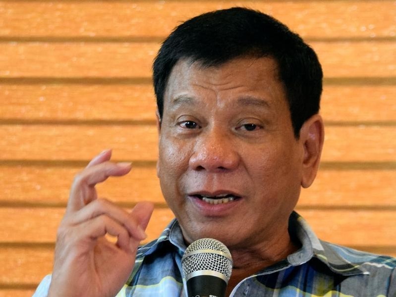 © Reuters. President-elect Rodrigo "Digong" Duterte speaks during a news conference in his hometown Davao City