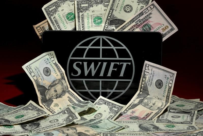 © Reuters. Photo illustration of the SWIFT logo
