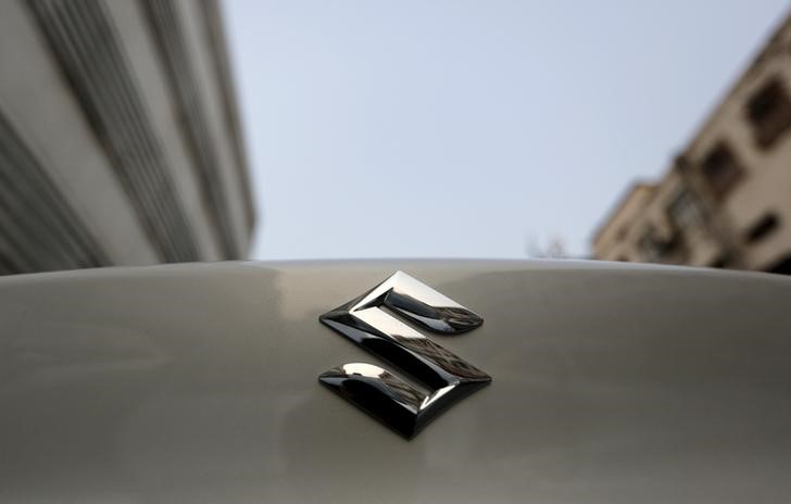 © Reuters. The logo of Maruti Suzuki India Limited is pictured on a car parked outside a showroom in New Delhi