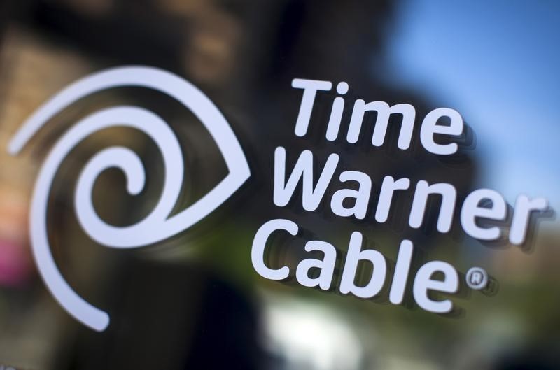 © Reuters. A Time Warner Cable sign and logo are seen on a Time Warner Cable store in the Manhattan borough of New York City