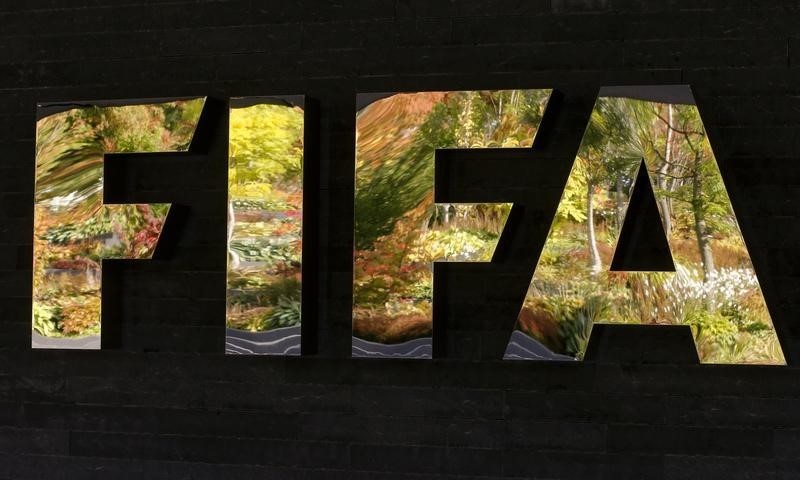 © Reuters. FIFA's logo is seen in front of its headquarters during a meeting of the FIFA executive committee in Zurich