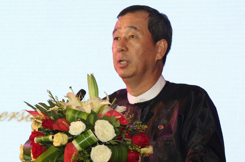 © Reuters. Myanmar businessman and owner of Asia World port terminal Steven Law speaks during terminal anniversary in Yangon, Myanmar