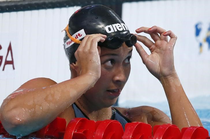© Reuters. Kromowidjojo of Netherlands reacts after women's 50m freestyle semi-final at Aquatics World Championships in Kazan