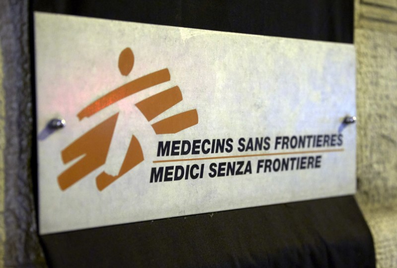 © Reuters. Sign is pictured over a black sheet outside the Medecins Sans Frontieres headquarters in Geneva, Switzerland