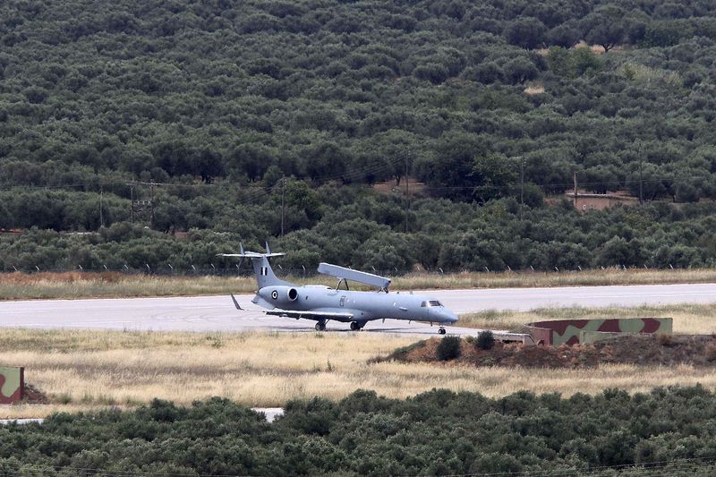 © Reuters.  Hellenic Air Force Erieye EMB-145H AEW&C aircraft taxis on tarmac after landing at the 133rd Hellenic Air Force Base in Kasteli on the island of Crete