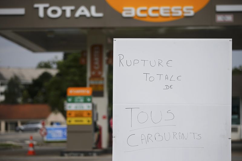 © Reuters. View of a placard which reads "total rupture of all fuels" at a petrol station in Vertou