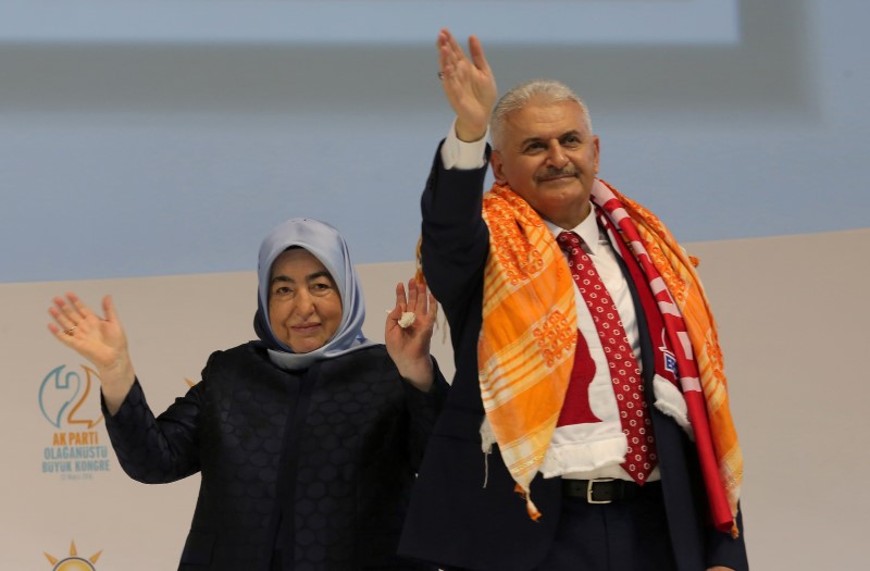 © Reuters. Turkey's Transportation Minister Yildirim greets members of his party during the AKP extraordinary congress in Ankara