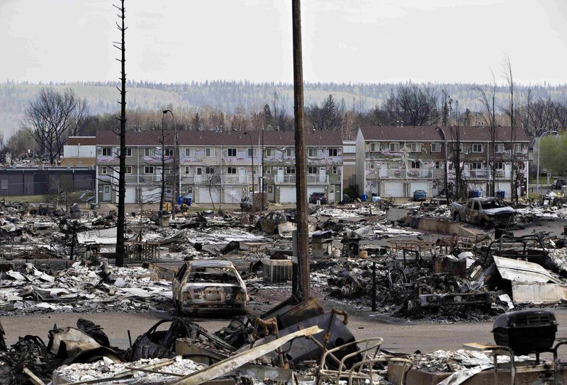 © Reuters. The devastated neighbourhood of Abasand is shown after being ravaged by a wildfire in Fort McMurray, Alberta, Canada