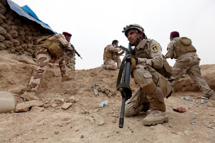 © Reuters. القوات العراقية تشتبك مع الدولة الإسلامية جنوبي الفلوجة
