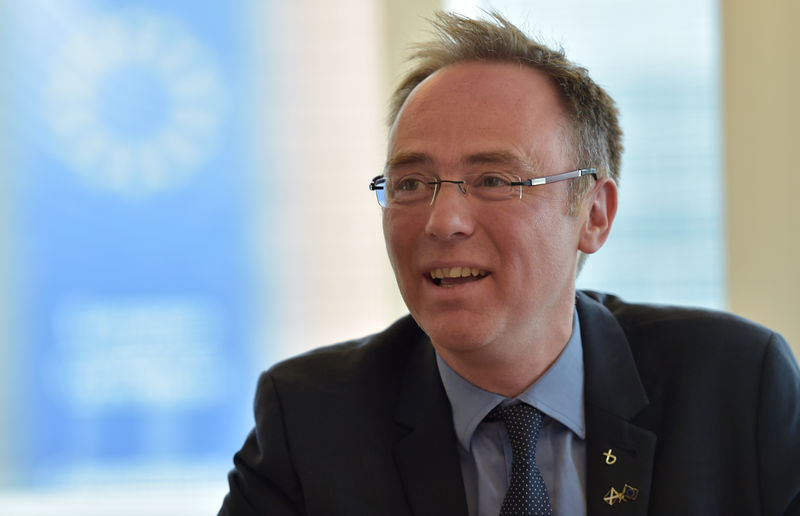 © Reuters. Scottish Europe Minister Allan talks to the media during a visit to Brussels