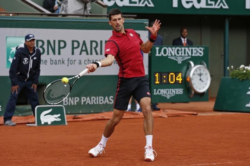 © Reuters. Tennis - French Open - Roland Garros - Novak Djokovic of Serbia vs Yen-Hsun Lu of Taiwan