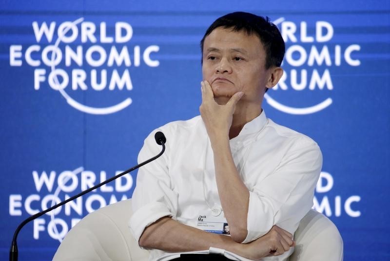© Reuters. Chairman and chief executive of Alibaba Group Ma reacts during a session at the WEF in Dalian