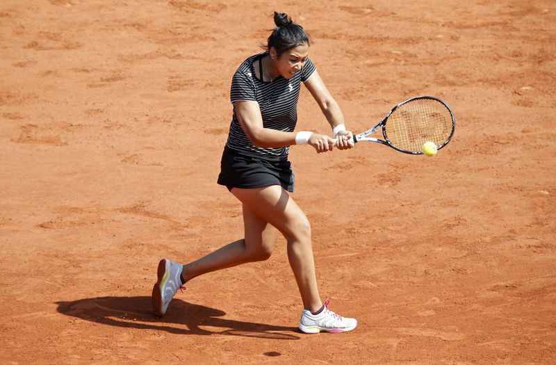 © Reuters. Tennis - French Open - Roland Garros - Simona Halep of Romania v Kazakhstan's Zarina Diyas - Paris