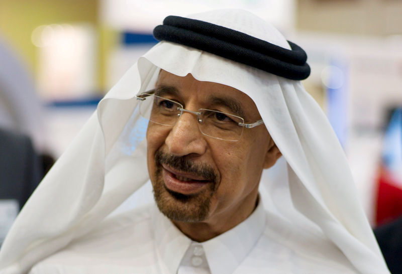 © Reuters. Saudi Aramco Chief Executive Officer Khalid al-Falih speaks to the media at the company's booth during Petrotech 2014 in Manama