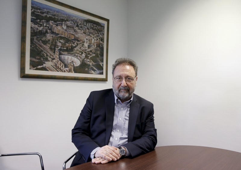 © Reuters. Chairman of the Hellenic Republic Asset Development Fund Pitsiorlas poses for a picture at his office before an interview with Reuters in Athens, Greece