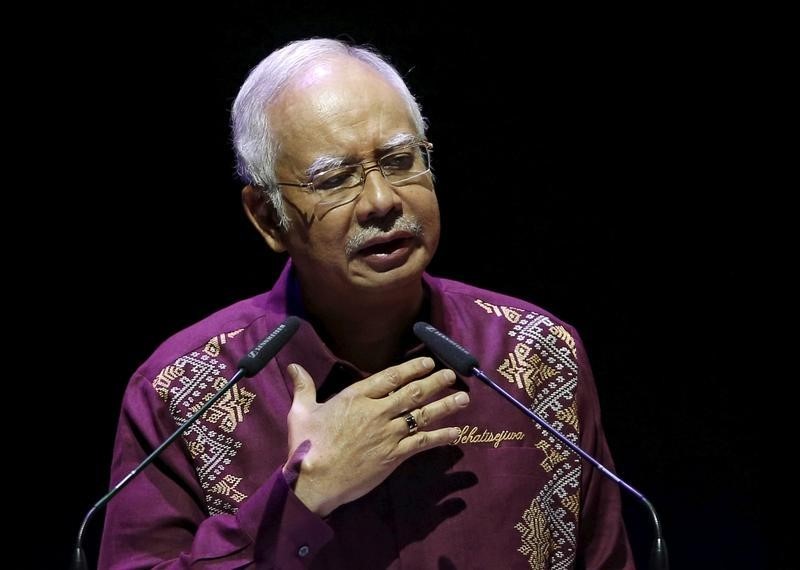 © Reuters. غضب في ماليزيا بسبب دعم الحكومة لتطبيق الحدود الإسلامية
