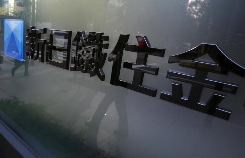 © Reuters. A logo of Nippon Steel & Sumitomo Metal Corp is pictured outside its headquarters in Tokyo