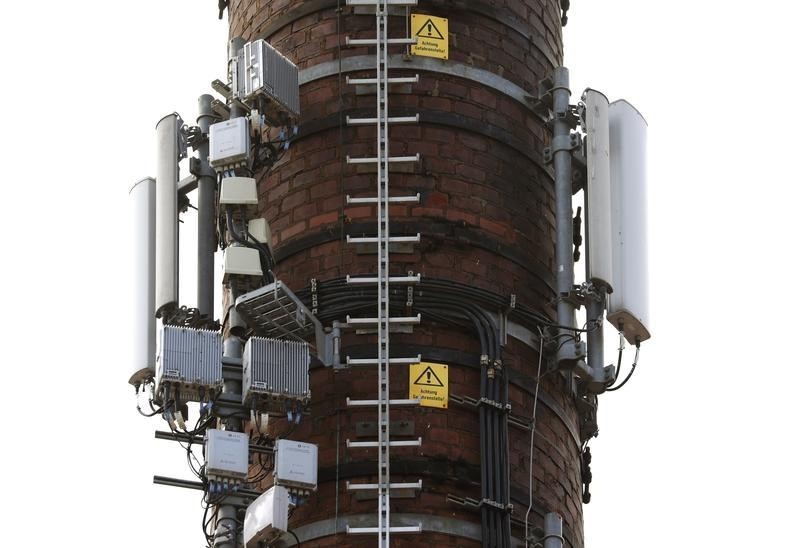 © Reuters. Connectors for mobile phone and data networks are seen on a chimney of a brick factory in the village of Friedland