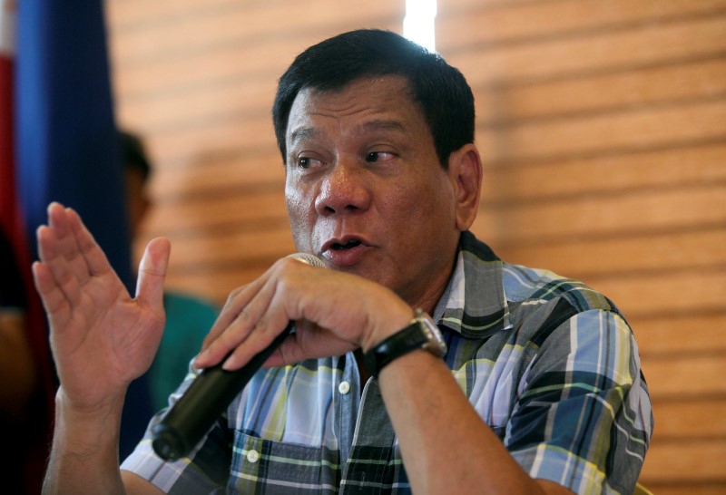 © Reuters. President-elect Rodrigo "Digong" Duterte speaks during a news conference in his hometown Davao City