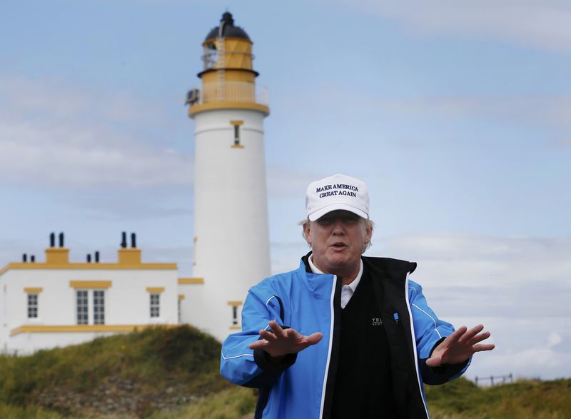 © Reuters. File photo of U.S. Republican presidential candidate and businessman Donald Trump gesturing as he tours his Trump Turnberry Resort in Scotland